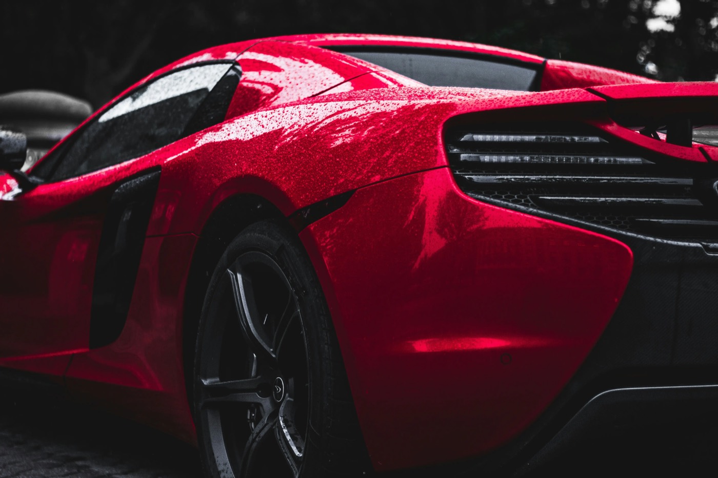 Rear three-quarter of a detailed red sports car